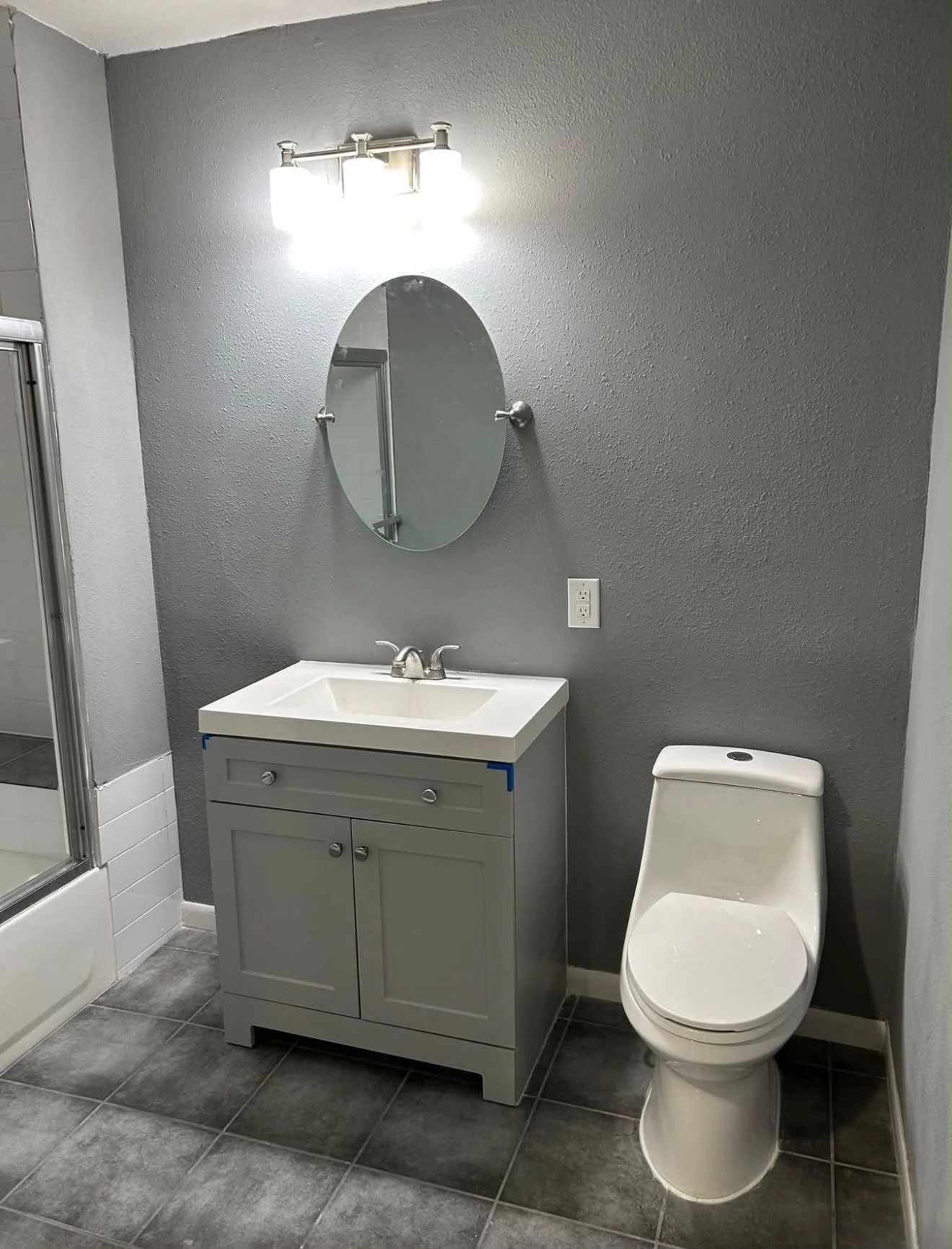 A Houston bathroom stripped back and rebuilt with a new vanity and finishes after the remodel