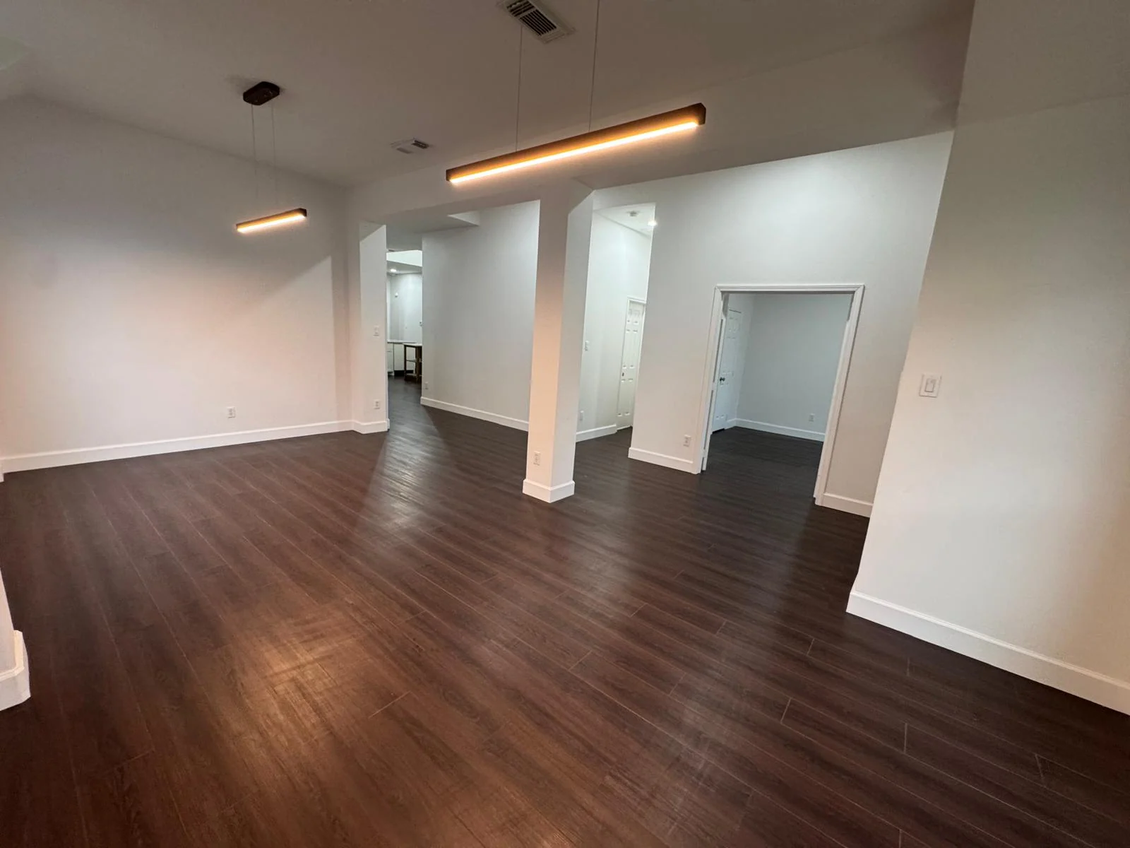 Freshly painted interior with new trim by LL General Contractor